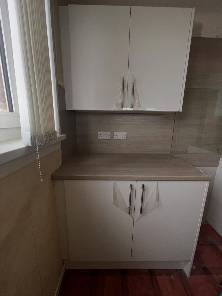 Kitchen worktop sockets and splashback supply installed in a Glasgow home